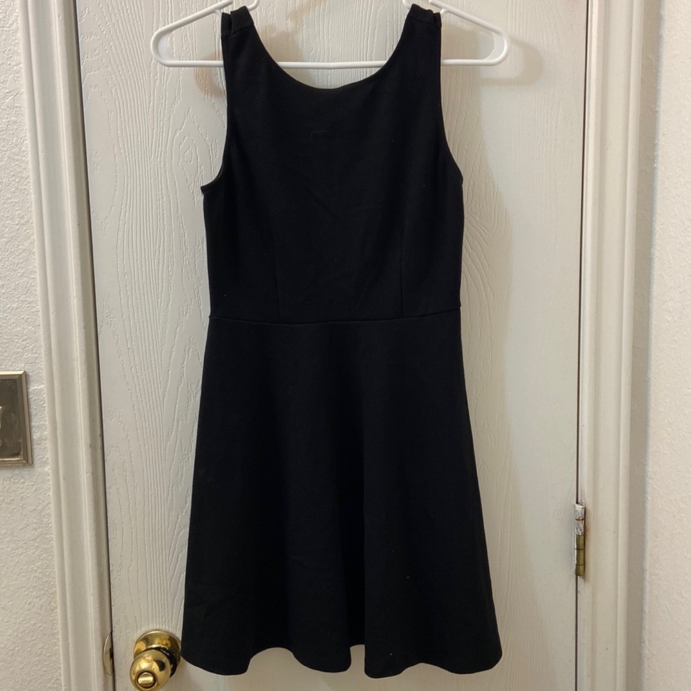 2 dresses for the price of one.. Both size Medium & short & fitted to the body